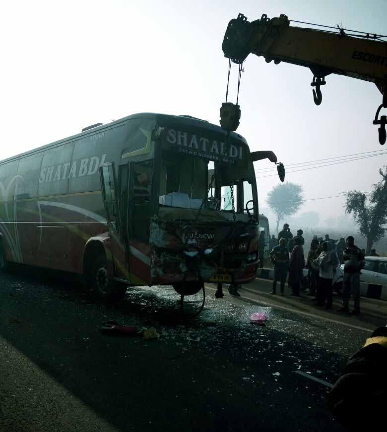 A bus being towed away after road accident on NH-11 near Kanota in Jaipur