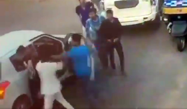 minister's son Raja beating up man